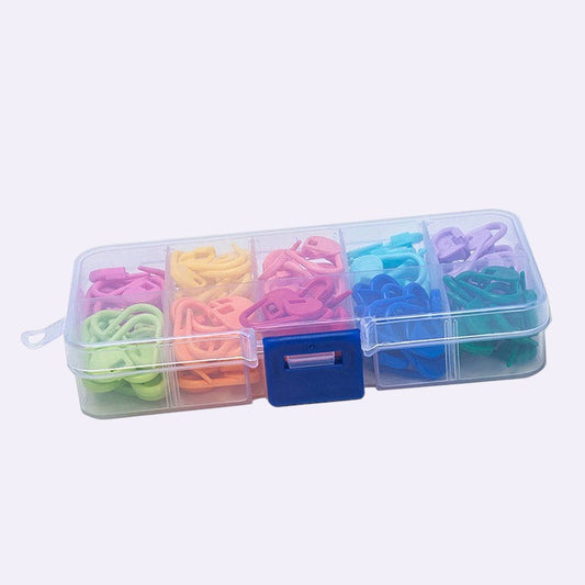 Stitch markers weaving set on clean background - Caldova