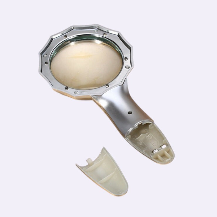 Lighted magnifier on clean background - Caldova