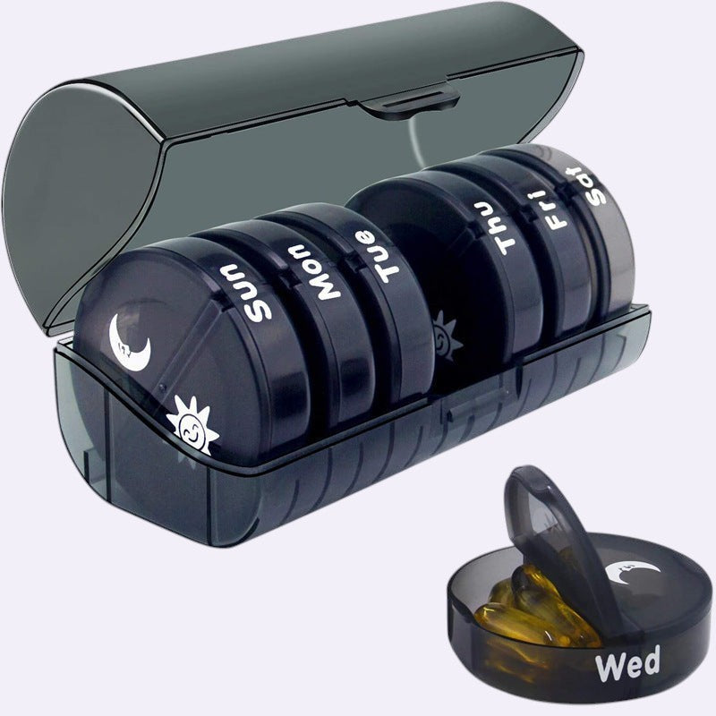 Pill organizer on clean background - Caldova