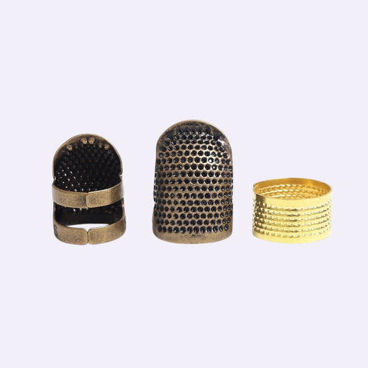 Thimble set on clean background - Caldova