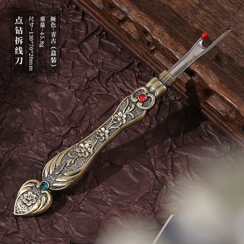 Ergonomic seam ripper with comfortable loop handle